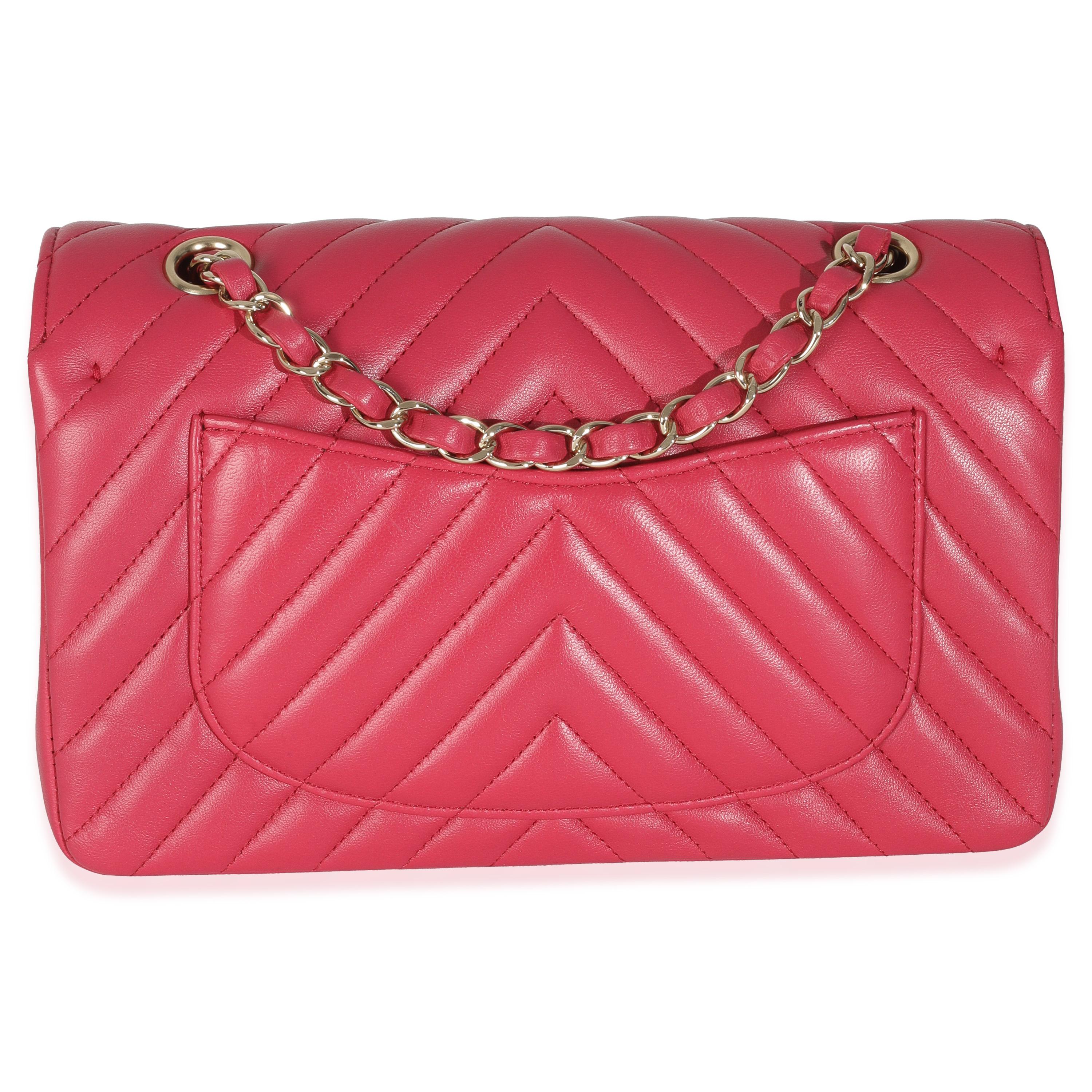 Listing Title: Chanel Dark Pink Chevron Lambskin Small Classic Double Flap Bag
SKU: 146809
Condition: Pre-owned 
Condition Description: A timeless classic that never goes out of style, the flap bag from Chanel dates back to 1955 and has seen a