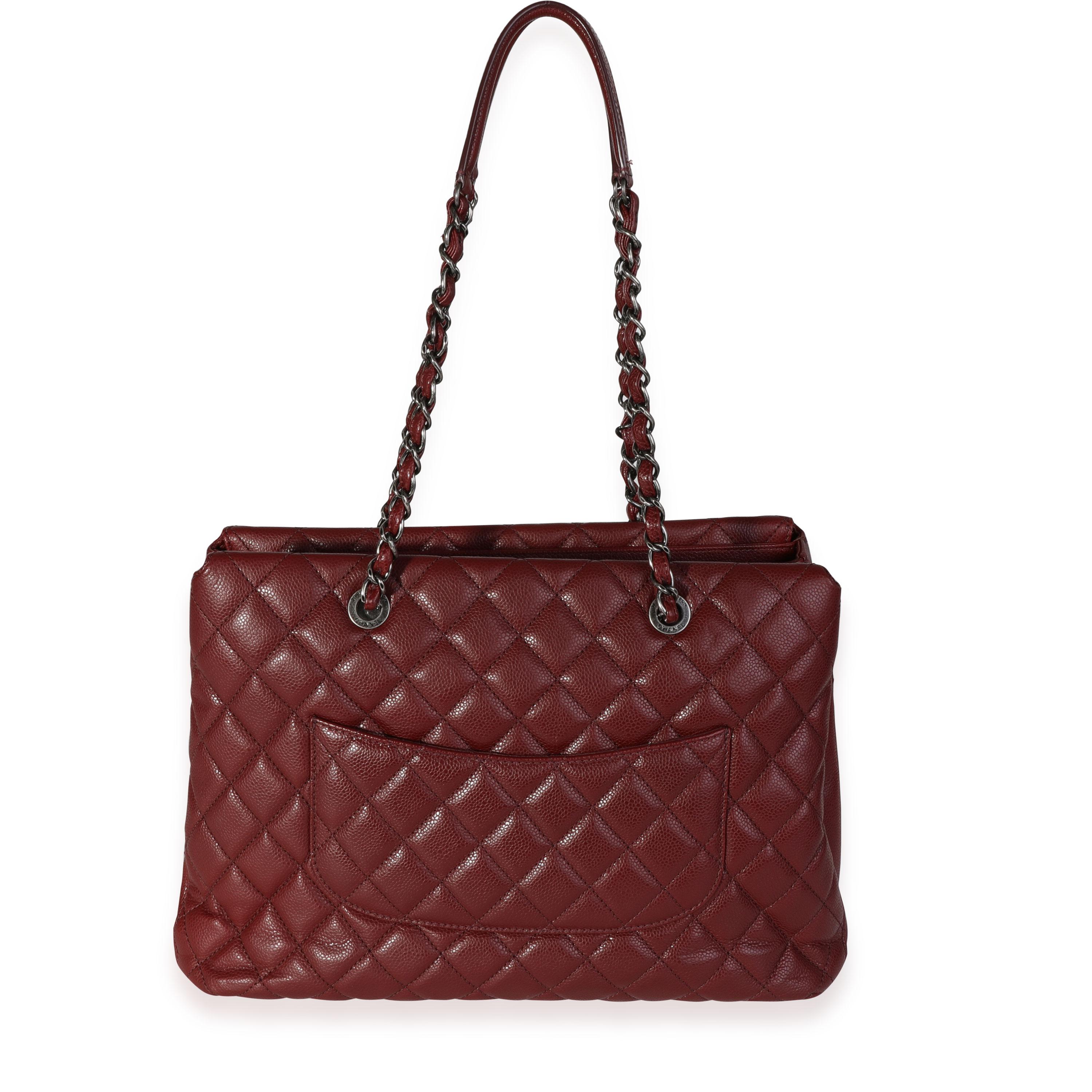 Listing Title: Chanel Dark Red Quilted Caviar City Shopping Tote
SKU: 118099
MSRP: 3500.00
Condition: Pre-owned (3000)
Handbag Condition: Excellent
Condition Comments: Excellent Condition. Light wear to corners. No other visible signs of