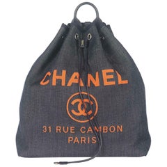 Chanel Deauville Leather Trimmed Canvas Backpack