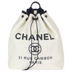 Chanel Deauville Leather Trimmed Raffia Backpack