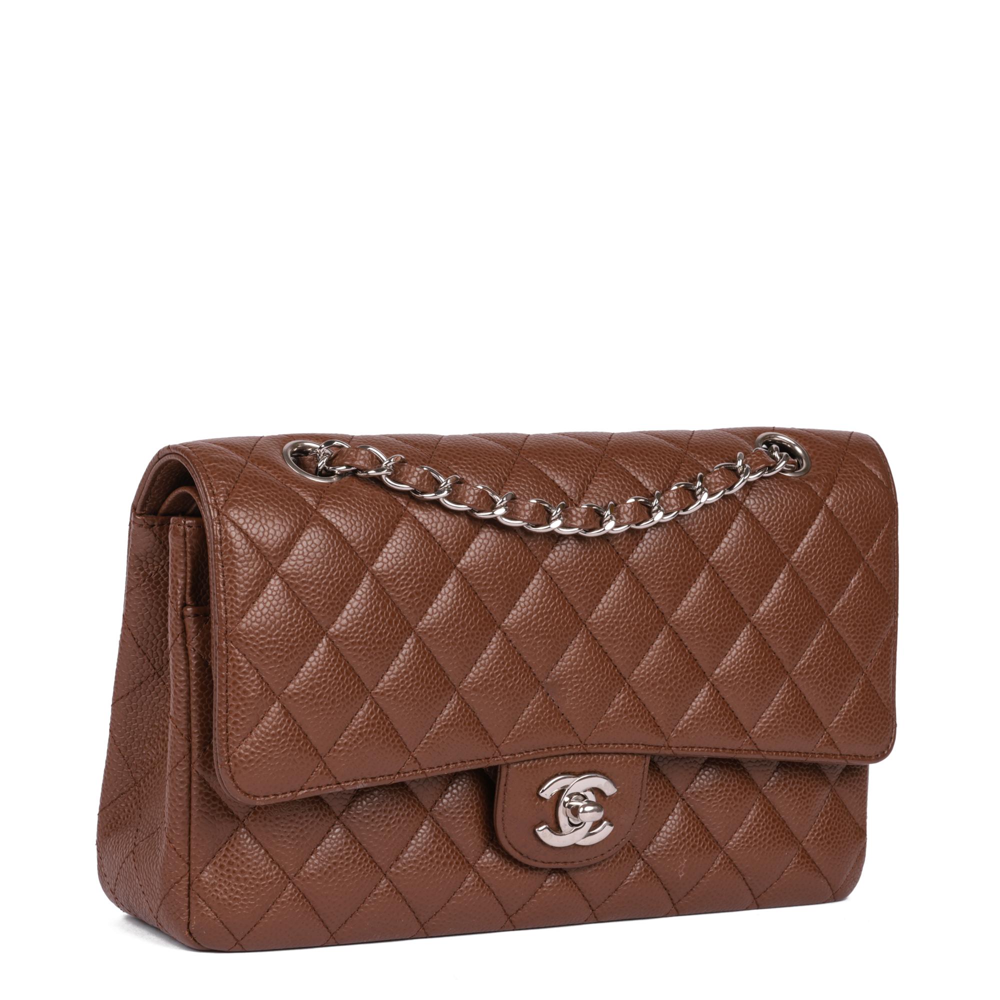 CHANEL
Deep Caramel Quilted Caviar Leather Medium Classic Double Flap Bag

Serial Number: 10996752
Age (Circa): 2005
Accompanied By: Chanel Dust Bag
Authenticity Details: Serial Sticker (Made in France)
Gender: Ladies
Type: Shoulder

Colour: Deep