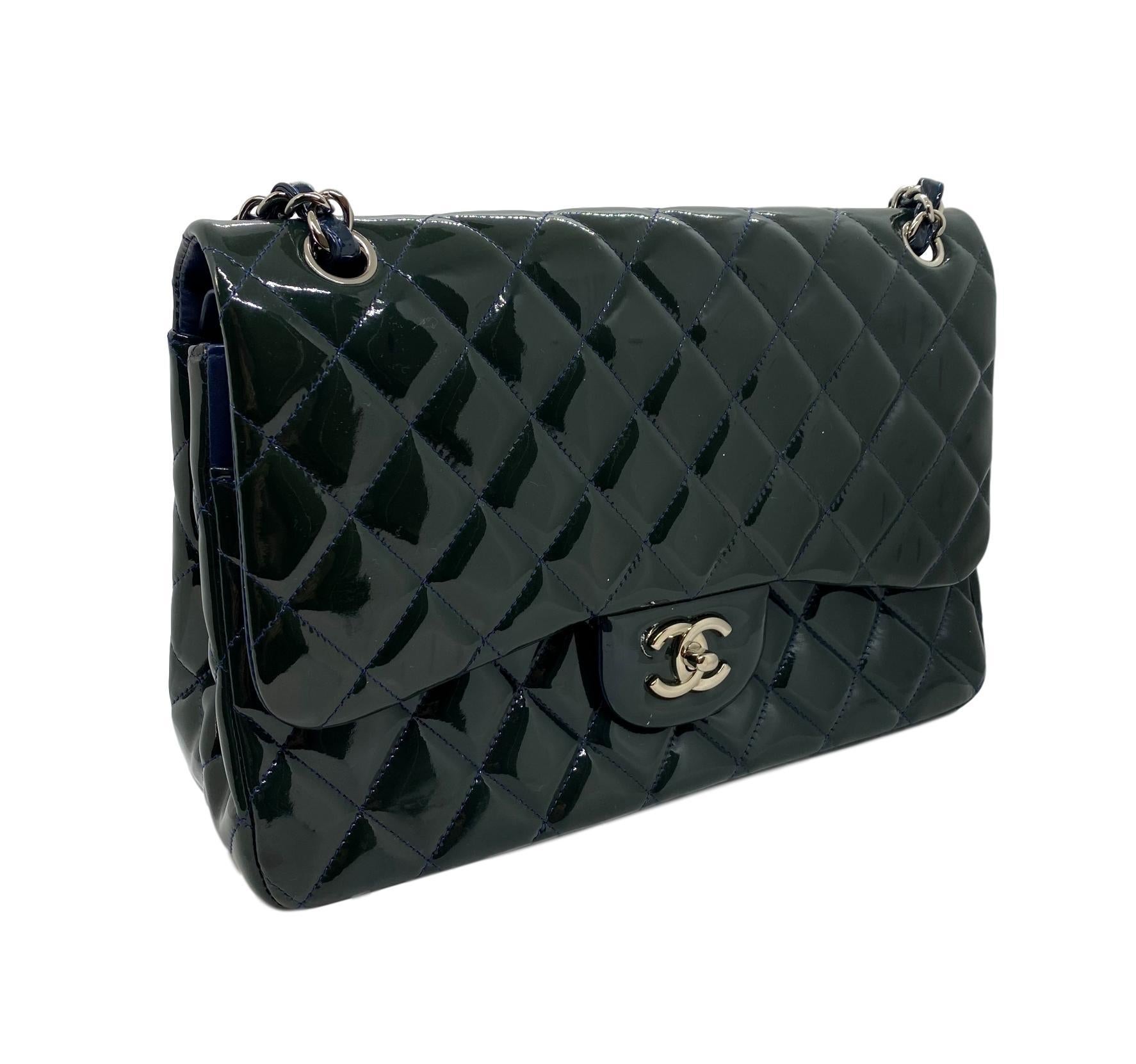 Chanel Deep Marine Patent Leather Jumbo Classic Double Flap Bag, 2010 - 2011. The iconic Chanel bag was originally issued by Coco Chanel in February 1955 which became the very first socially acceptable shoulder bag for the modern day woman of