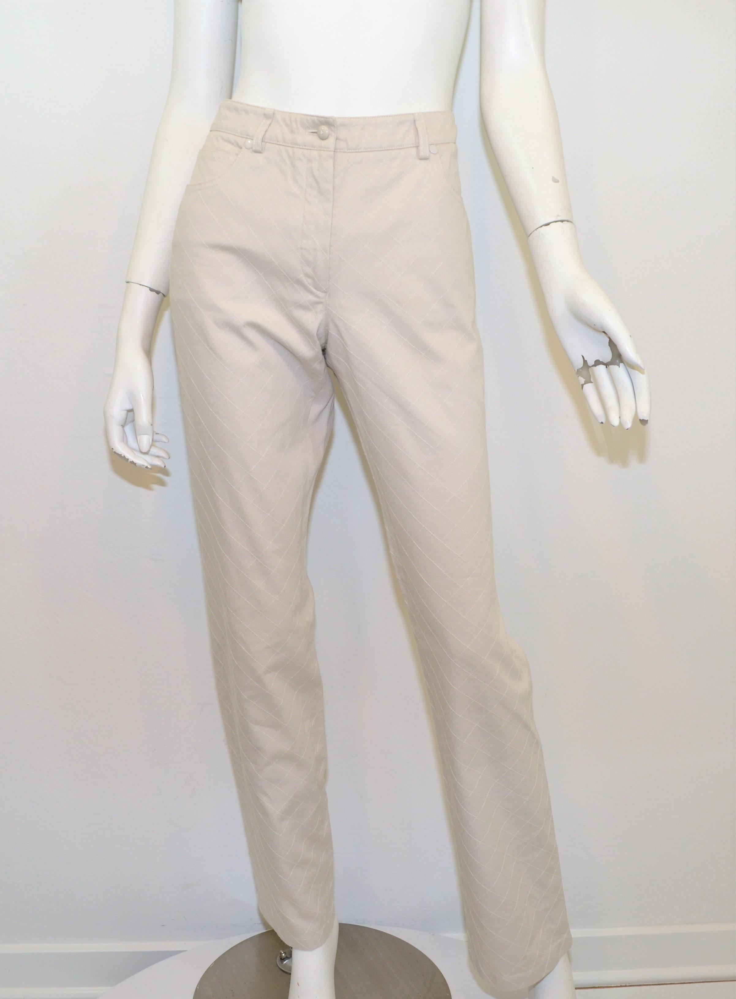 Chanel Beige Denim Pants features diamond-stitch work with a zipper and button fastening with three functioning pockets at the front and two on the back. Jeans are a size 42 -- Measurements are as follows:

Waist 33''
Hips 38''
Inseam 32''
Rise