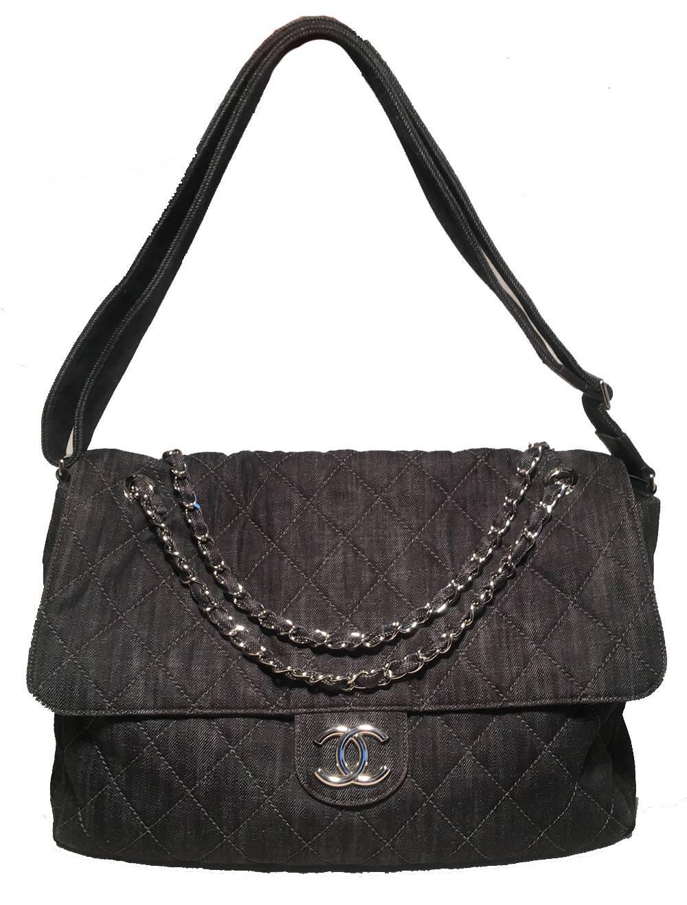 Chanel Denim Quilted XL Classic Messenger Flap Shoulder Bag Tote in excellent condition.  Dark denim quilted exterior trimmed with shining silver hardware.  Single flap snap closure opens to a light grey nylon lined interior that holds 2 storage