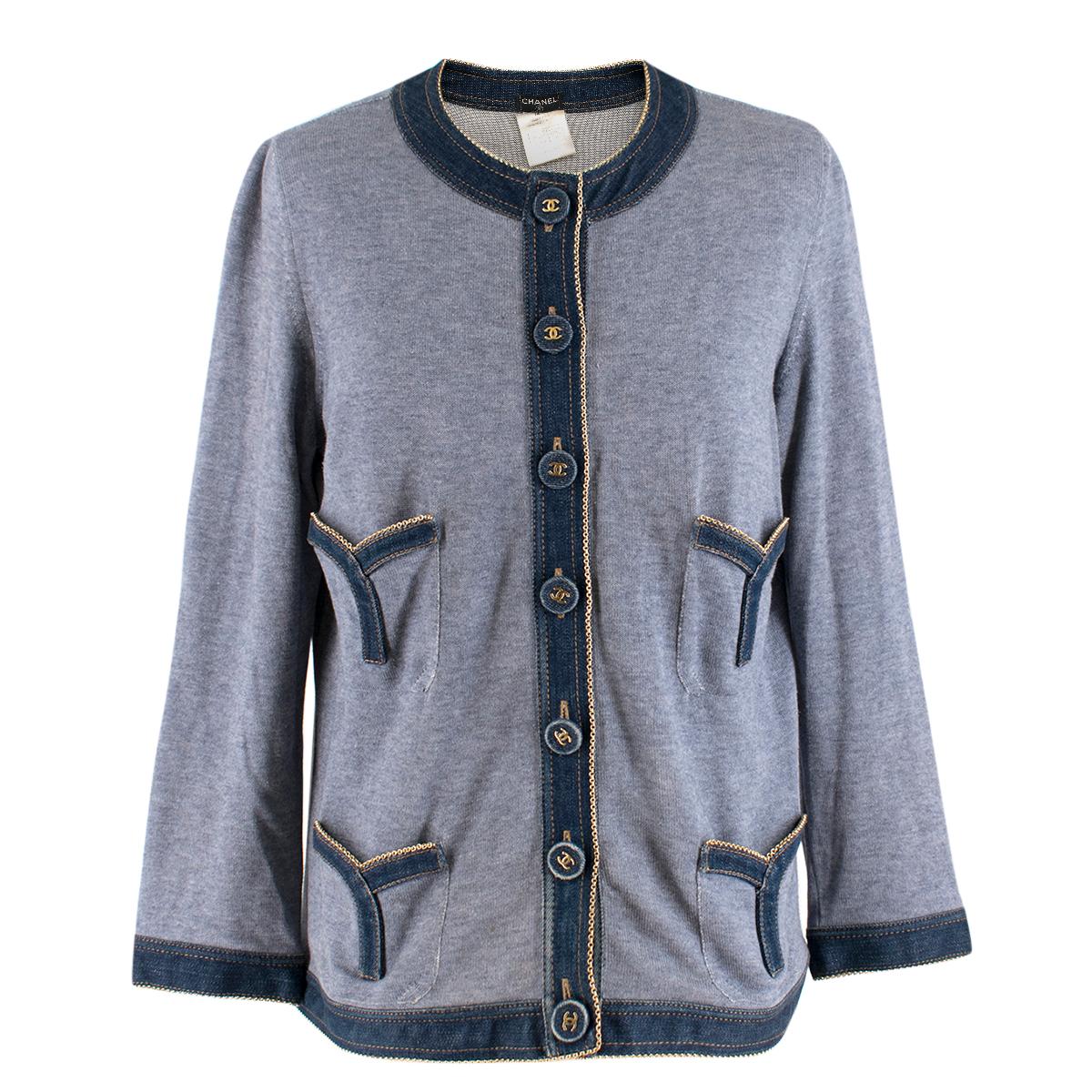Chanel denim-trimmed cardigan

- Blue, mid-weight cotton, silk and cashmere-blend knit 
- Round neck, long sleeves 
- Blue denim trimmed neckline, placket, cuff and hem, gold-tone chain edges 
- Denim-covered buttons, logo plaque 
- 80% cotton, 10%