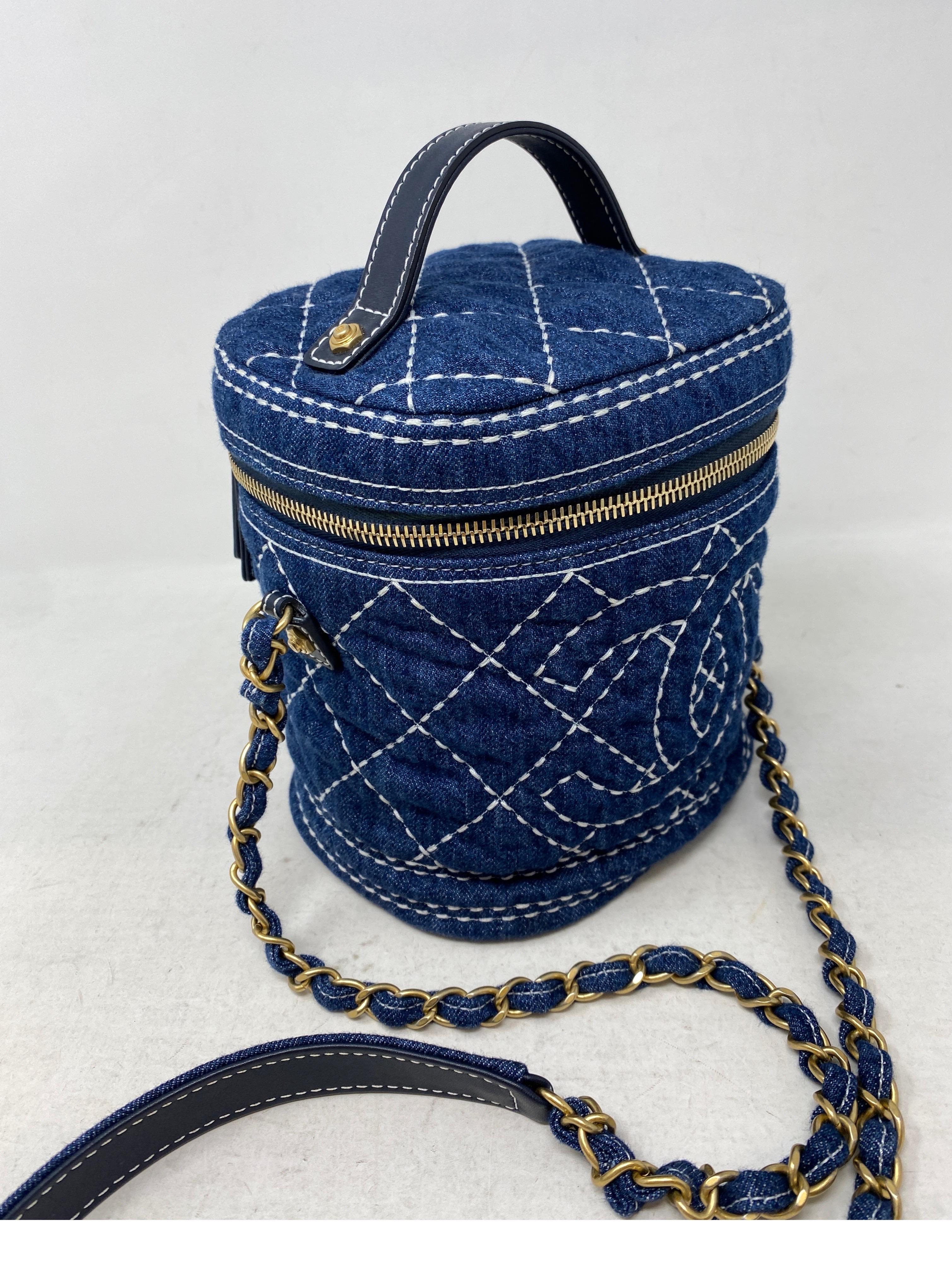 Chanel Denim Vanity Bag. Gorgeous denim bag. Collector's piece. New condition. Includes authenticity card and serial number inside bag. Includes dust cover. Guaranteed authentic. 