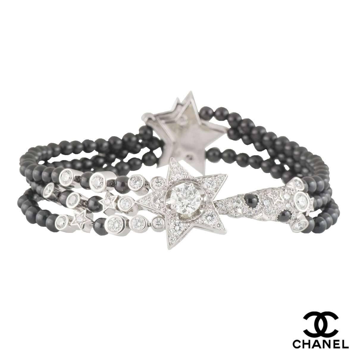 A beautiful 18k white gold diamond and spinel Chanel bracelet from the Comete collection. The bracelet comprises of a star motif set to the centre with a 0.45ct round brilliant cut diamond in a 4 claw setting in the middle of the star, F colour and