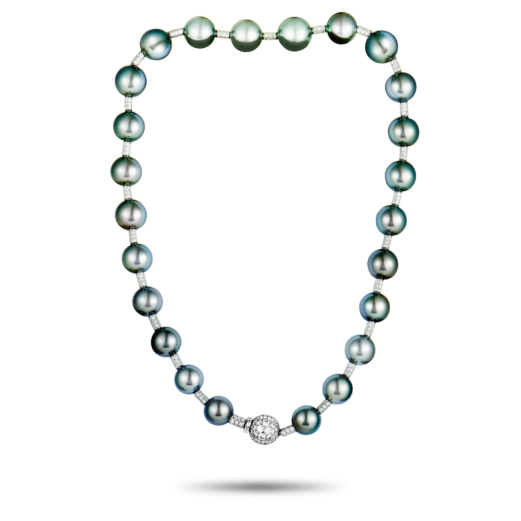 A design by Chanel, this extraordinary necklace is made of elegant 18K white gold and boasts a plethora of enticing black pearls and scintillating diamonds. The diamonds weigh in total approximately 6.00 carats and the pearls measure from 10.5 to
