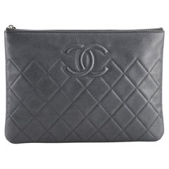 Chanel Diamond CC O Case Clutch Quilted Caviar Medium