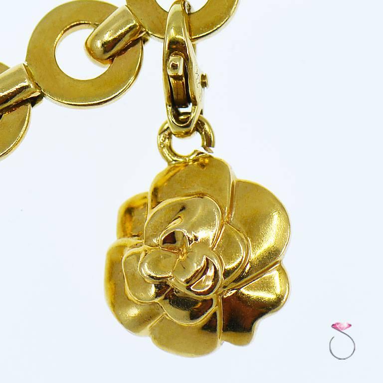 18 karat gold charm bracelet