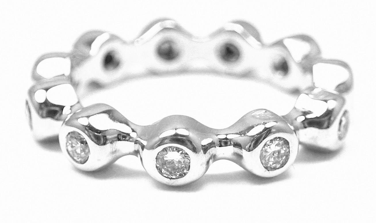 18k White Gold Diamond Eternity Band Ring. 
With 11 round brilliant cut diamonds, Totaling 0.55ctw, VS1 Clarity Color G
Details:
Size: 4 1/4
Width: 4.5mm
Weight: 4.9 grams
Stamped Hallmarks: Chanel 750 1C3963
*Free Shipping within the United
