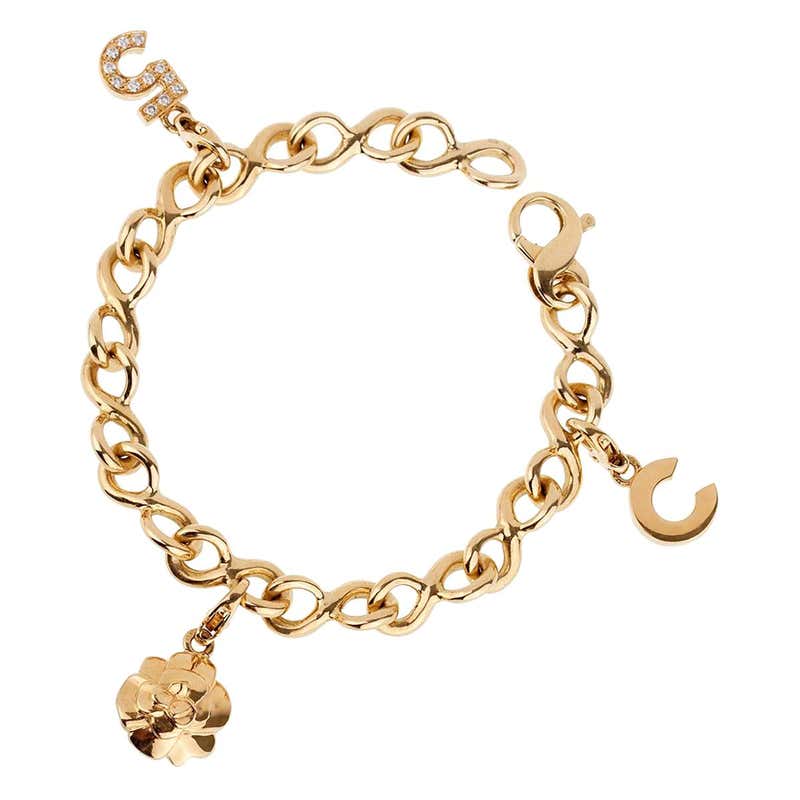 Chanel Camelia Gold Charm Bracelet For Sale at 1stdibs