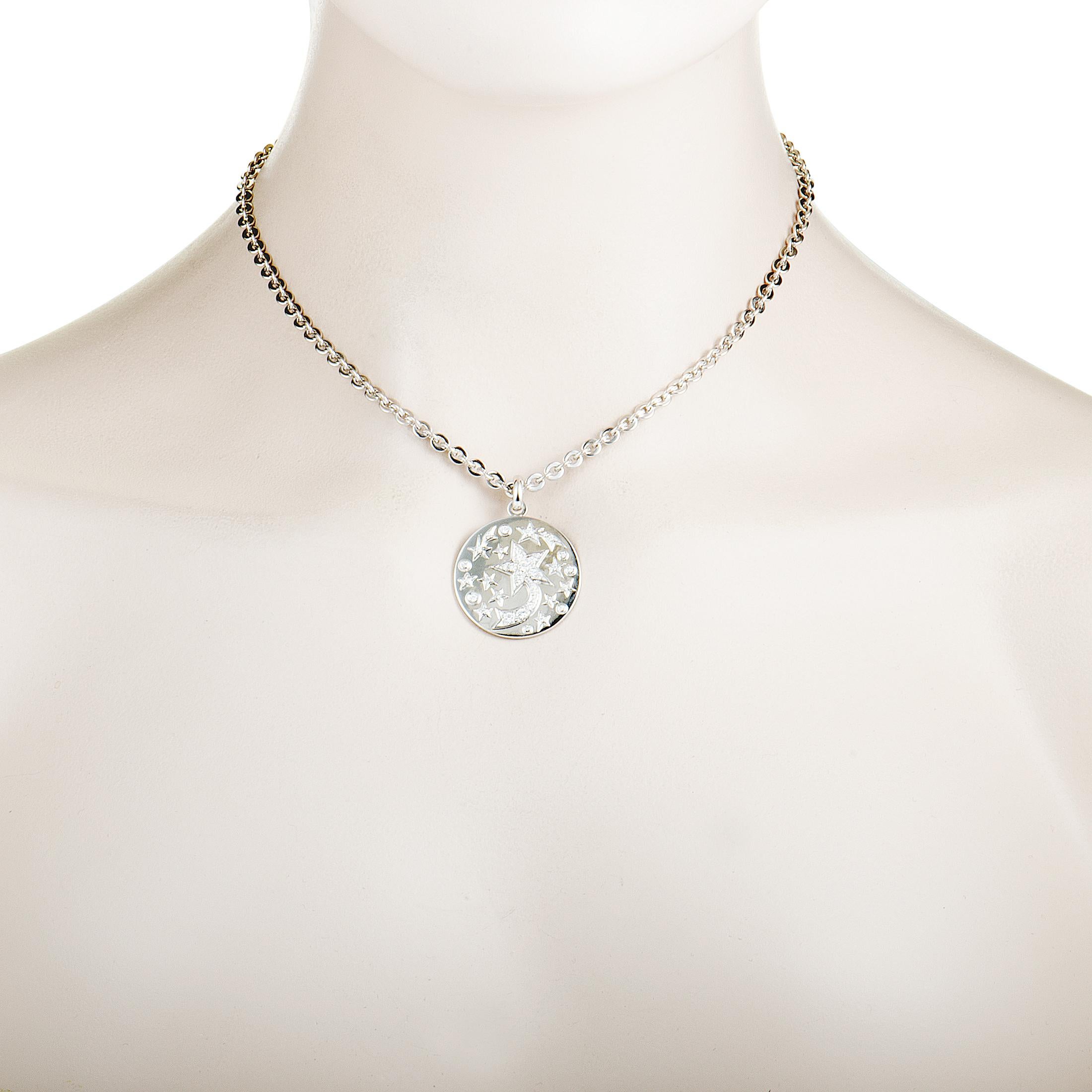 Add a delightful touch of refined glisten to your ensembles with this gorgeous Chanel necklace that is presented with a stylish chain onto which a beautifully designed pendant is attached. The necklace is made of 18K white gold and it is decorated