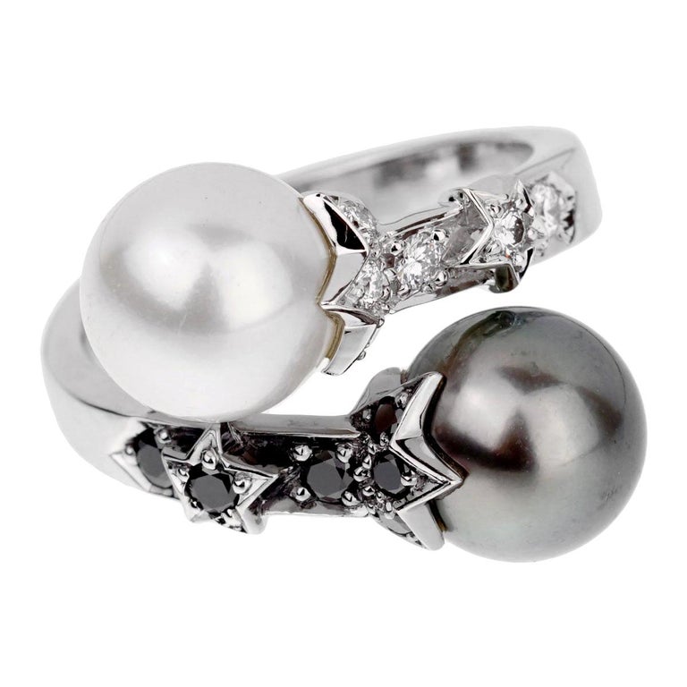 Diamond and pearl bypass ring, 2000s, offered by Opulent Jewelers