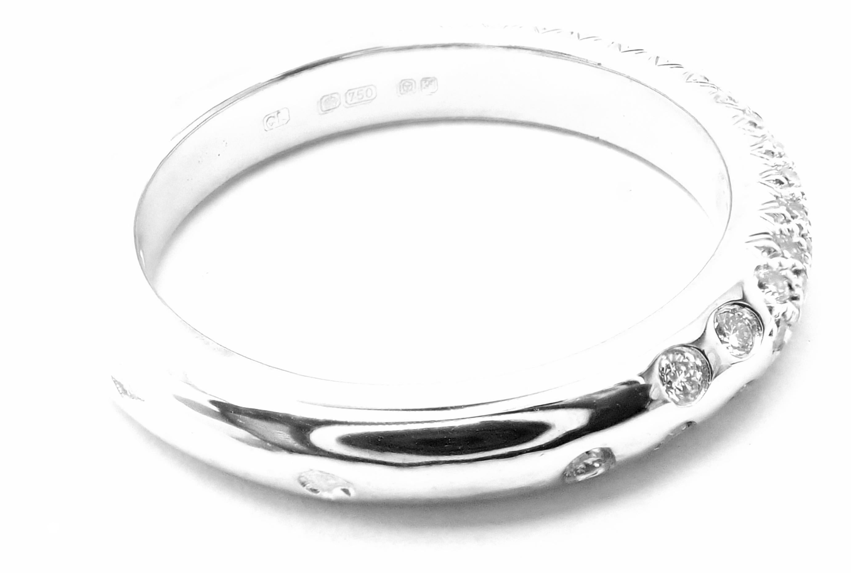 18k White Gold Diamond Band Ring by Chanel.
With Round Brilliant Cut Diamonds VVS1 clarity, E color total weight approximately .70ct
Details: 
Size:6
Width: 4mm
Weight: 5.4 grams
Stamped Hallmarks: Chanel 750 15G742
*Free Shipping within the United