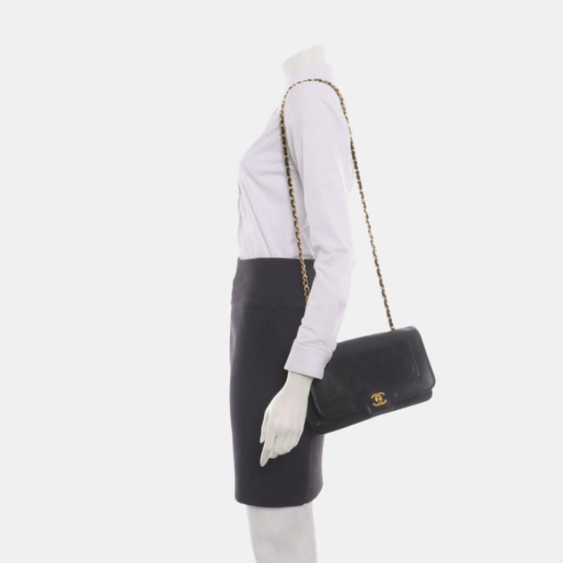 Chanel Diana CC Flap Bag Medium Vintage Black Lambskin Leather with 24k Gold HW, 1991-1994
 These are professional photos of the actual bag.
 This one-of-a-kind Chanel Diana CC Flap Vintage bag exudes sophistication and timeless elegance. Crafted