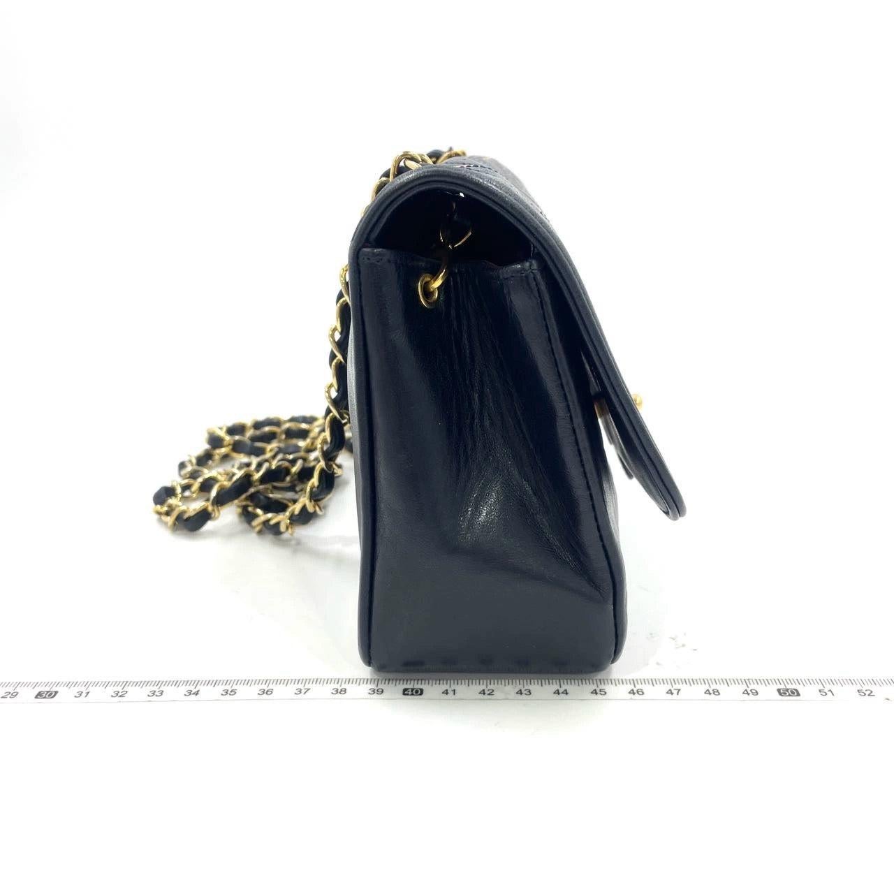 Chanel Diana CC Flap Bag Small Vintage Black Lambskin Leather with 24k Gold HW, 1989-1991
 These are professional photos of the actual bag.
 This one-of-a-kind Chanel Diana CC Flap Vintage bag exudes sophistication and timeless elegance. Crafted