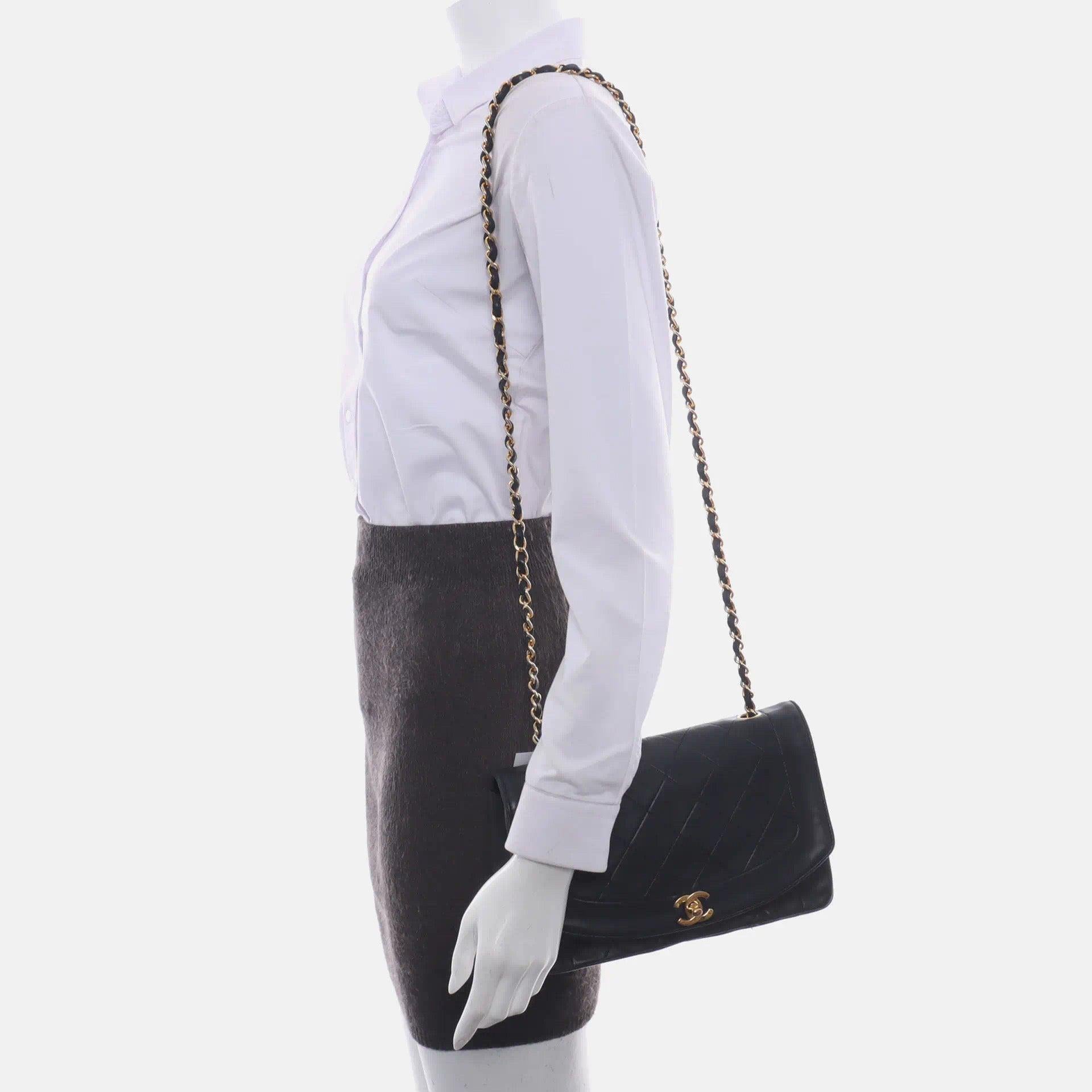 Chanel Diana CC Flap Bag Vintage 1989 Black Lambskin Leather with 24k Gold Hardware

This one-of-a-kind Chanel Diana CC Flap Vintage bag exudes sophistication and timeless elegance. Crafted from luxurious black lambskin leather, it is adorned with