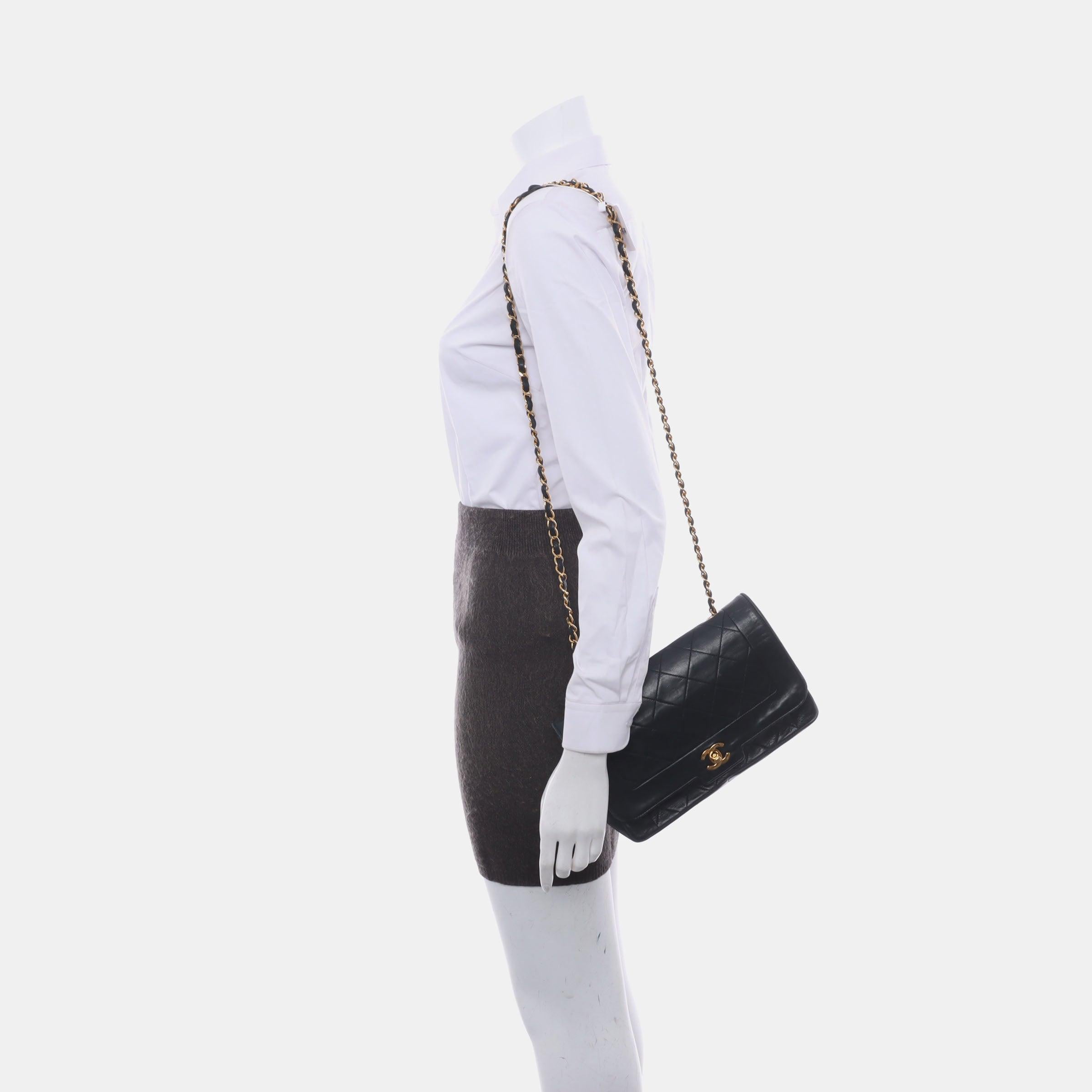 Chanel Diana CC Flap Bag Vintage Black Lambskin Leather with 24k Gold HW, 1989-1991
 These are professional photos of the actual bag.
 This one-of-a-kind Chanel Diana CC Flap Vintage bag exudes sophistication and timeless elegance. Crafted from