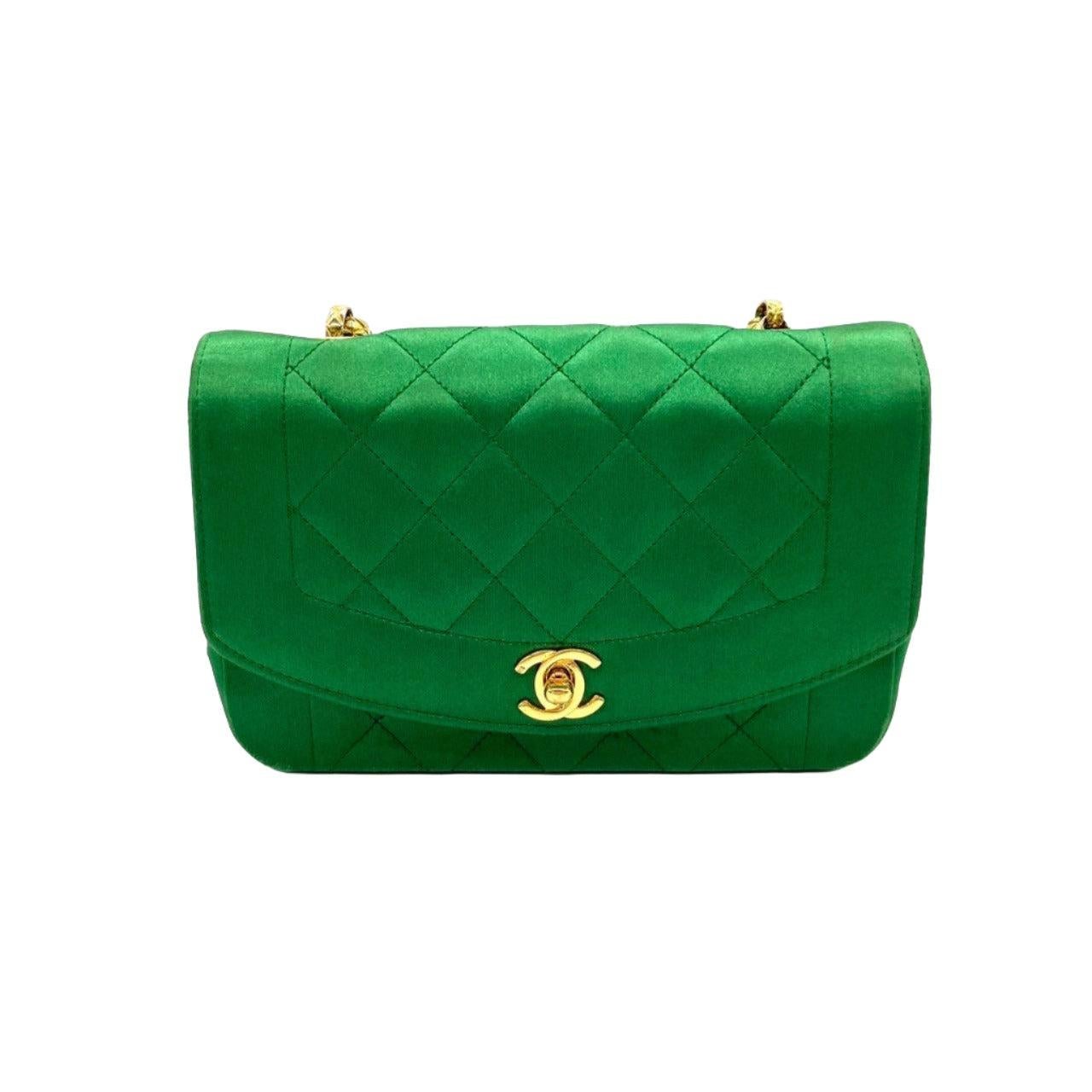 Chanel Diana Flap Bag 1990 Mini Green Silk Satin Bijou Chain These are professional photos of the actual bag offered by Luxbags. This exquisite Chanel Diana Flap Bag from 1990 is more than just a bag - it is a luxurious piece of jewelry, a bold