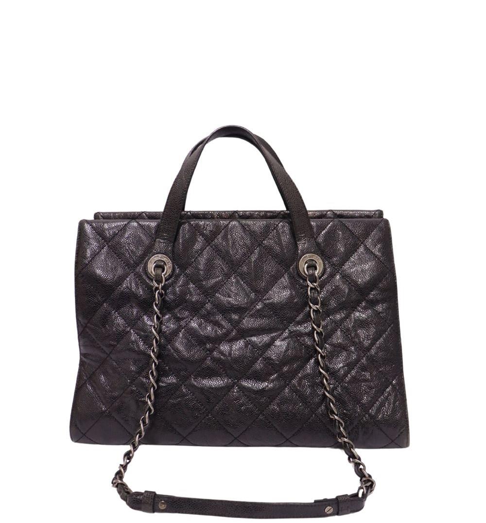 Chanel Distressed Glazed Caviar CC Crave Tote Bag , Features CC Logo Chain Detail, Three Compartments, Glazed Caviar Leather, Two Leather Handles, Two Chained Handles and Multiple Interior Pockets.

Material: Leather
Hardware: Silver
Height:
