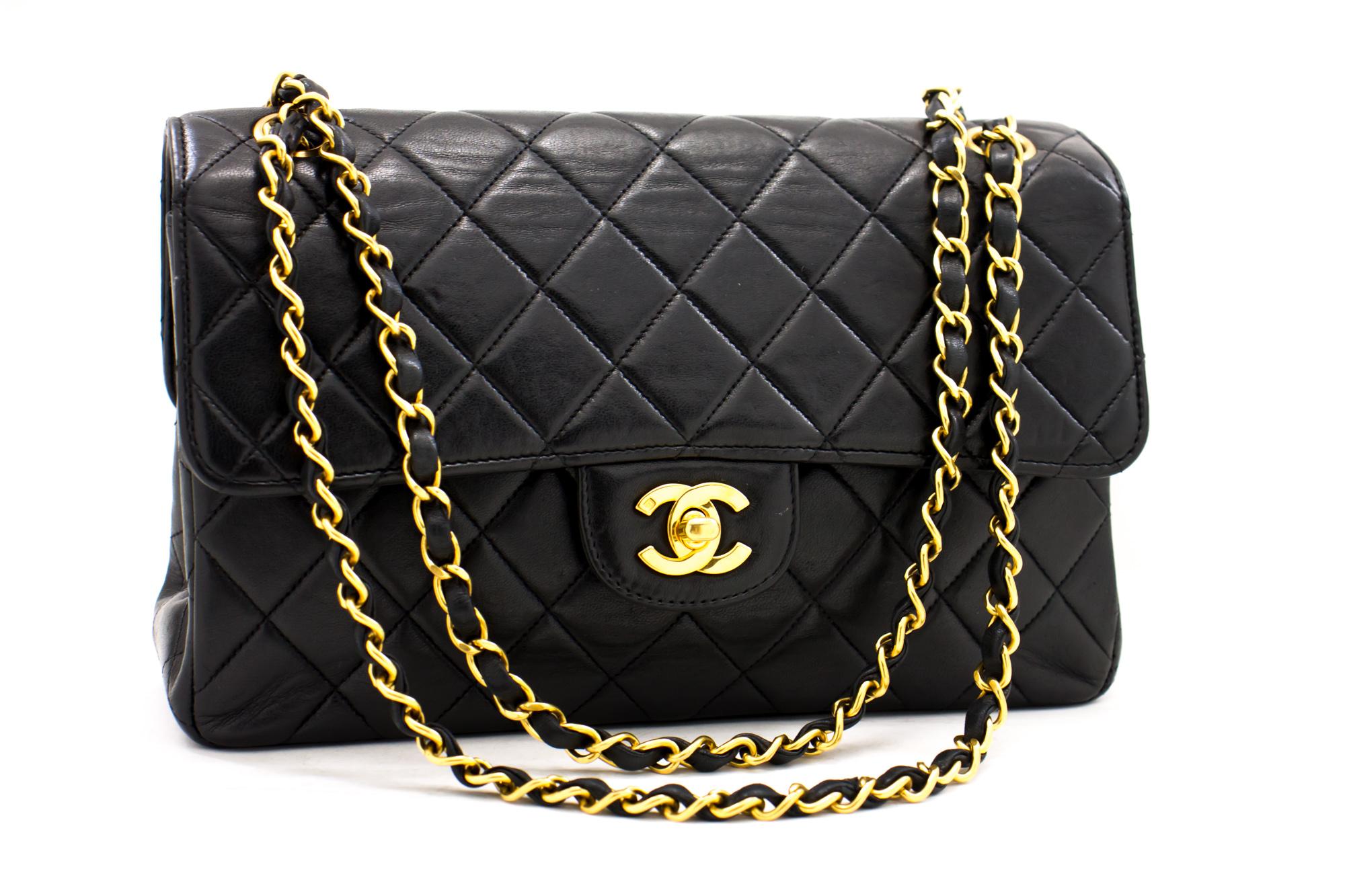An authentic CHANEL Double Faces W Sided Chain Shoulder Bag Black Quilted Flap. The color is Black. The outside material is Leather. The pattern is Solid. This item is Vintage / Classic. The year of manufacture would be 1994-1996.
Conditions &
