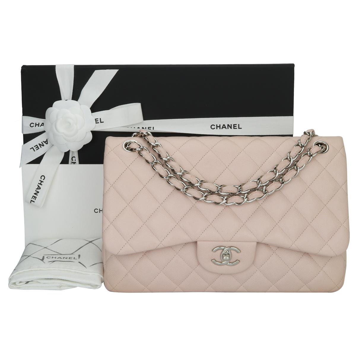 Authentic CHANEL Classic Double Flap Jumbo Bag Baby Pink Caviar with Silver Hardware 2014.

This stunning bag is in excellent condition, the bag still holds its original shape, and the hardware is still very shiny.

Exterior Condition: Excellent