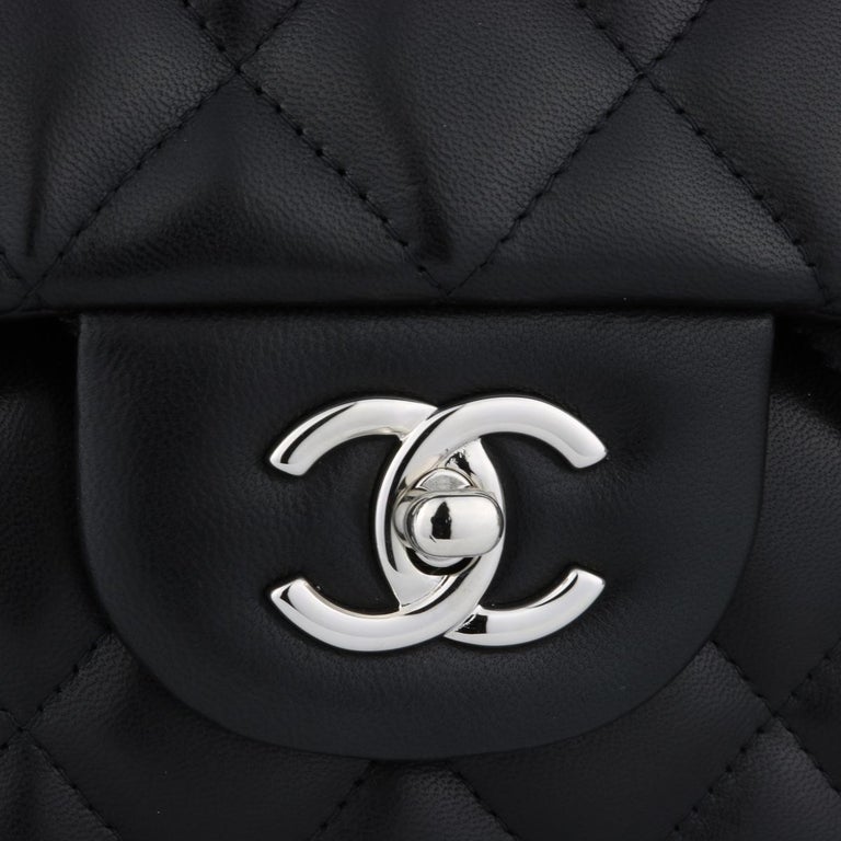 white and gold chanel purse black