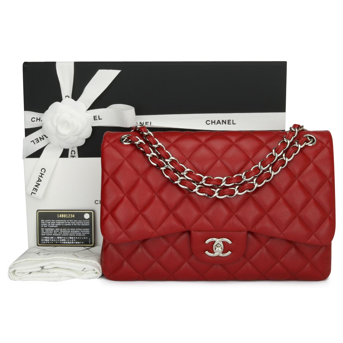 Authentic CHANEL Classic Double Flap Jumbo Bag Rich Red Caviar with Silver Hardware 2010.

This stunning bag is in mint-pristine condition, the bag still holds its original shape, and the hardware is still very shiny.

Exterior Condition: Mint
