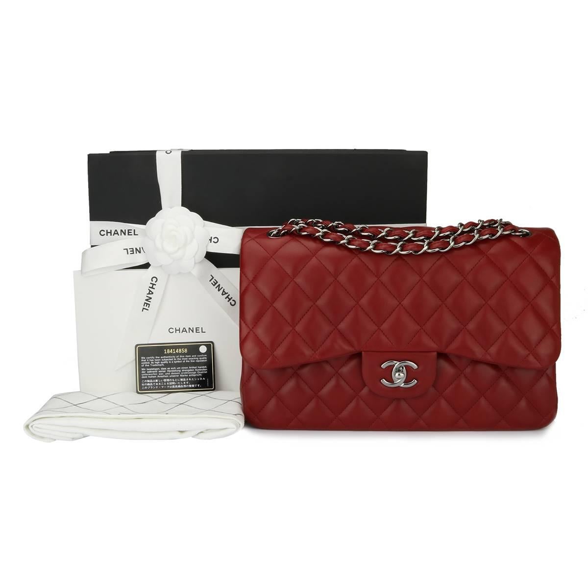 Authentic CHANEL Classic Double Flap Jumbo Bag Lipstick Red Lambskin with Light Gunmetal Hardware 2014.

This stunning bag is in a mint condition, the bag still holds its original shape, and the hardware is still very shiny. Leather smells fresh as