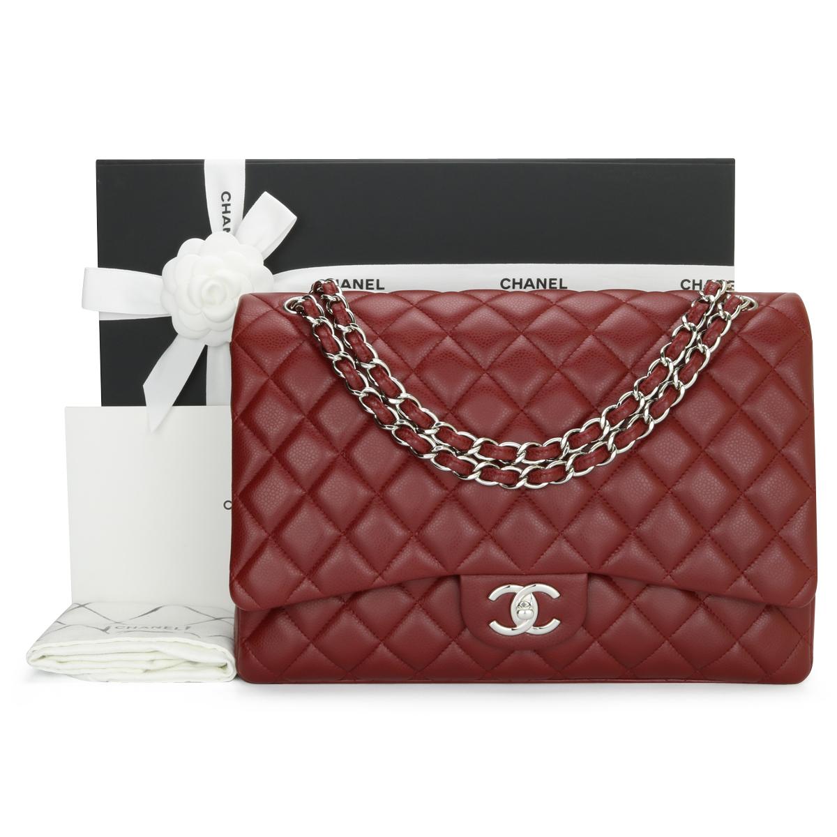 CHANEL Classic Double Flap Maxi Bag Dark Red Burgundy Caviar with Silver Hardware 2011.

This stunning bag is in excellent condition. The bag still holds its original shape, and the hardware is still very shiny.

- Exterior Condition: Excellent