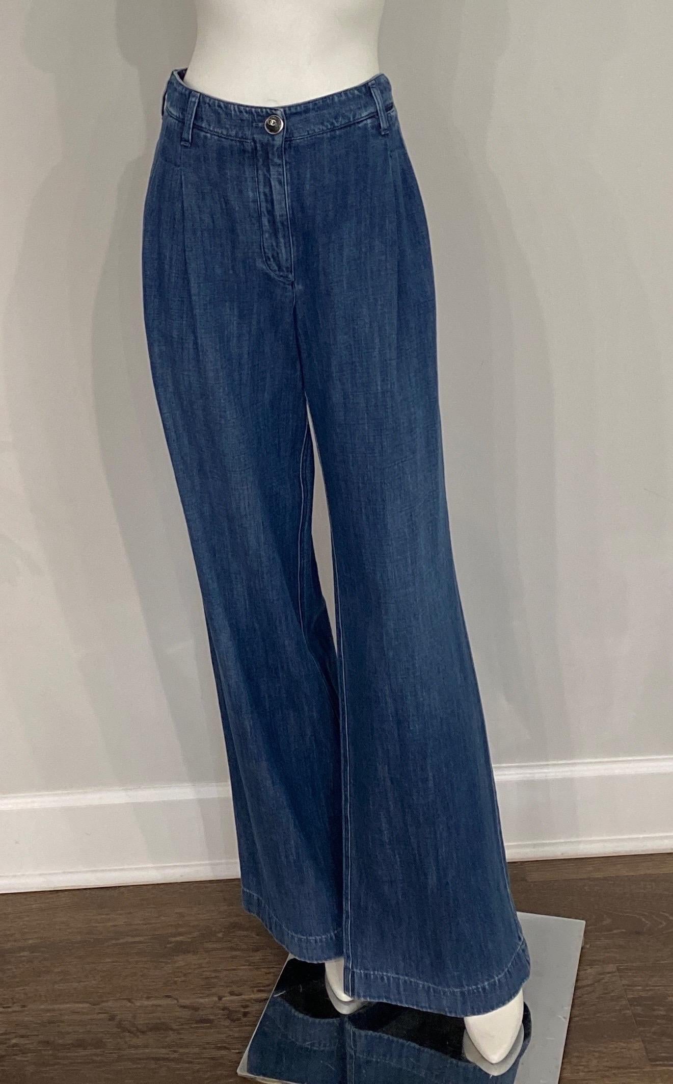 Chanel Double Pleated Flare Cotton Denim Pants-Size 42-2008P These jean pants are NWT, never worn and are made of a lightweight cotton. The pants have double pleats on each side, a front zipper with a top button closure. The button is made of a