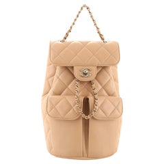 Chanel Double Pocket Flap Bucket Backpack Quilted Caviar
