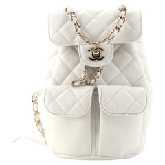 Chanel Double Pocket Flap Bucket Backpack Quilted Caviar