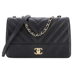 Chanel Black Chevron Quilted Wrinkled Goatskin Medium Medallion Charm Flap  Gold Hardware, 2014 Available For Immediate Sale At Sotheby's