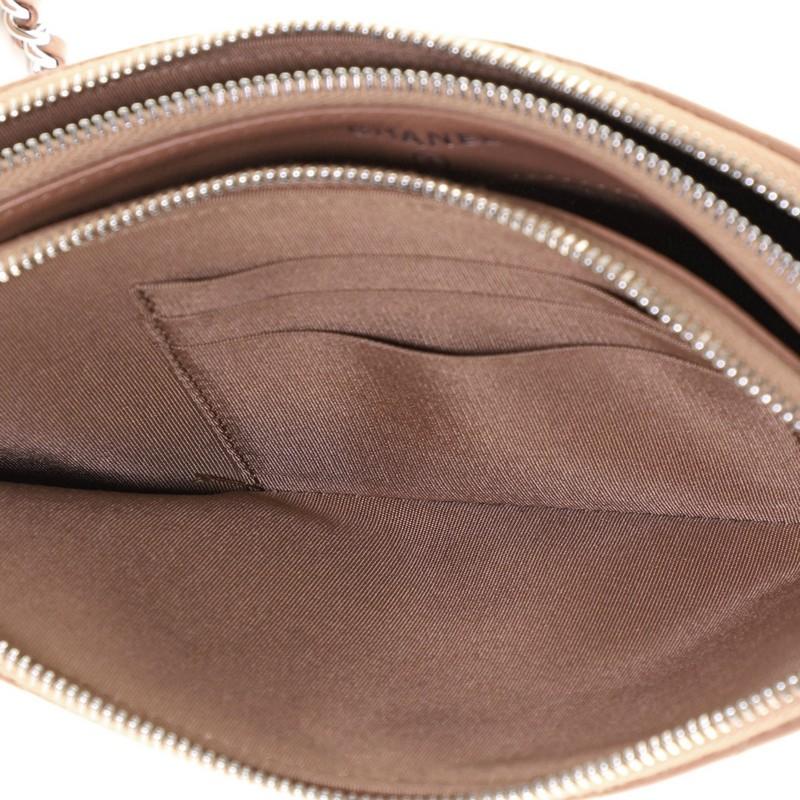 Chanel Double Zip Clutch with Chain Chevron Lambskin with Studded Detail In Good Condition In NY, NY