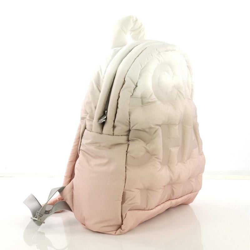 chanel embossed doudoune backpack