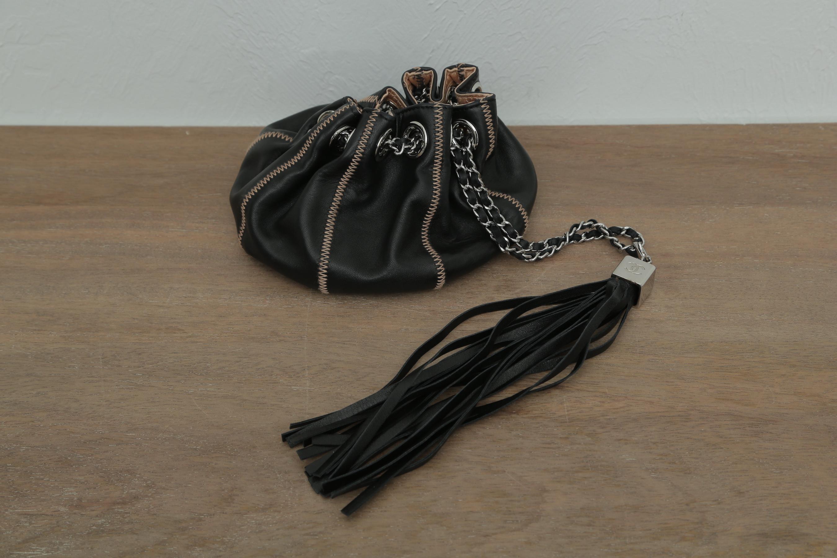 Chanel Drawstring Bag Reversible Sac Cordon Black Lambskin Leather Wristlet In Excellent Condition In West palm beach, FL