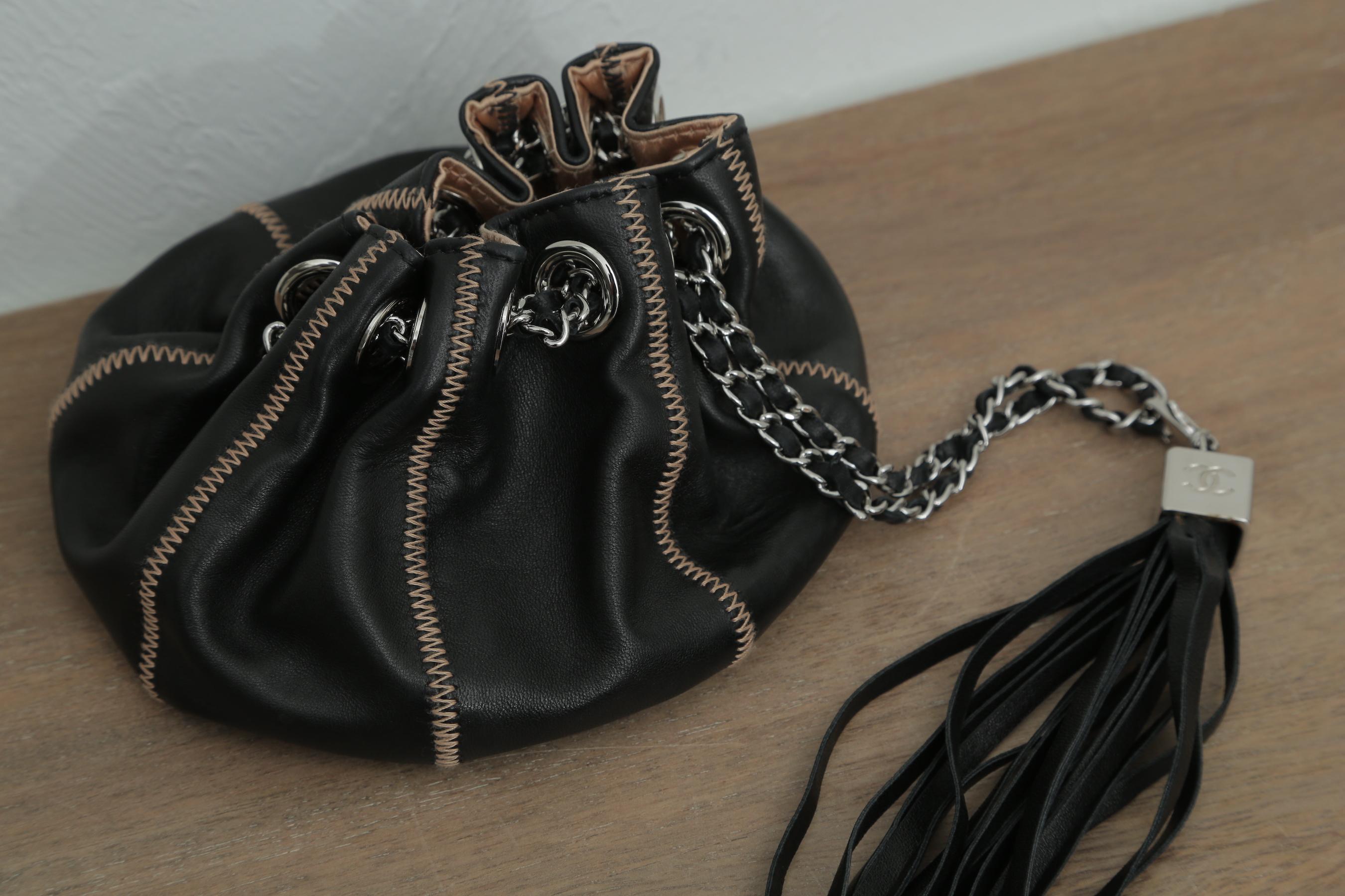 Women's Chanel Drawstring Bag Reversible Sac Cordon Black Lambskin Leather Wristlet