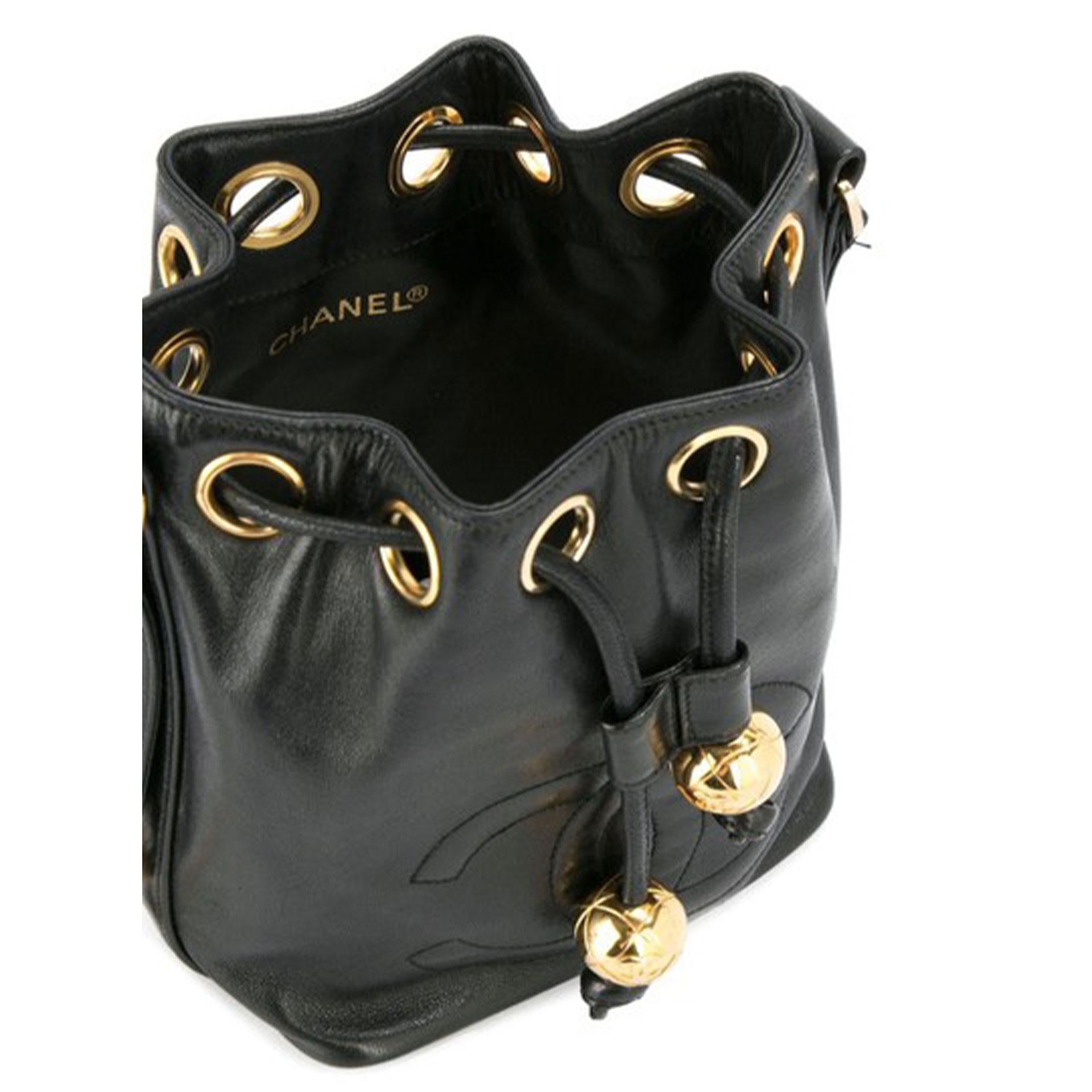 Women's or Men's Chanel Drawstring Bucket Caviar Mini Black Lambskin Leather Cross Body Bag For Sale