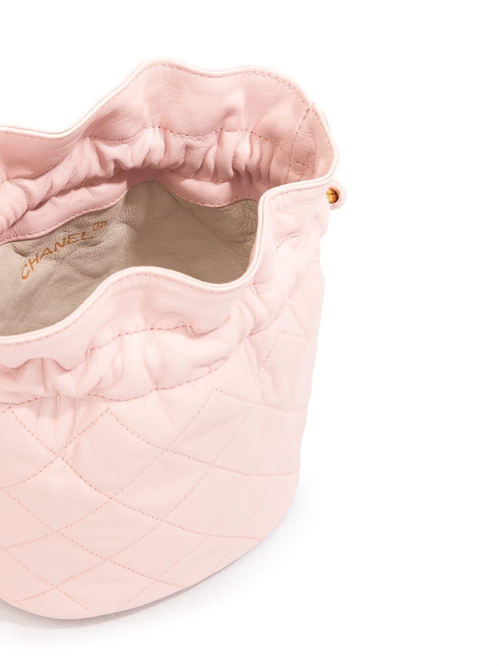 Women's or Men's Chanel Drawstring Bucket Quilted Two Tone Light Pink Lambskin Leather Hobo Bag For Sale