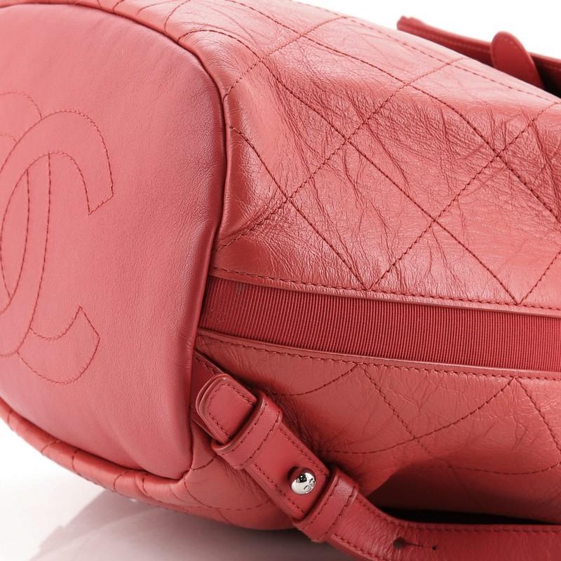 Women's or Men's Chanel Drawstring CC Flap Backpack Quilted Aged Calfskin and Grosgrain Sm