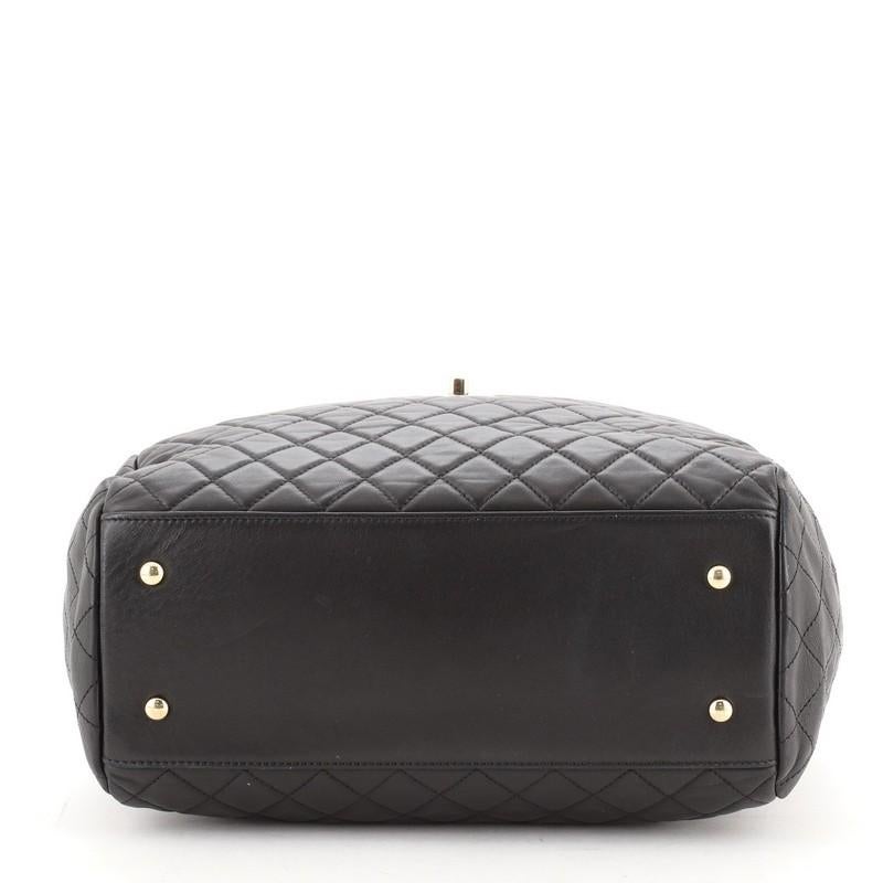 Chanel Drawstring CC Lock Bucket Bag Quilted Lambskin Medium In Good Condition In NY, NY
