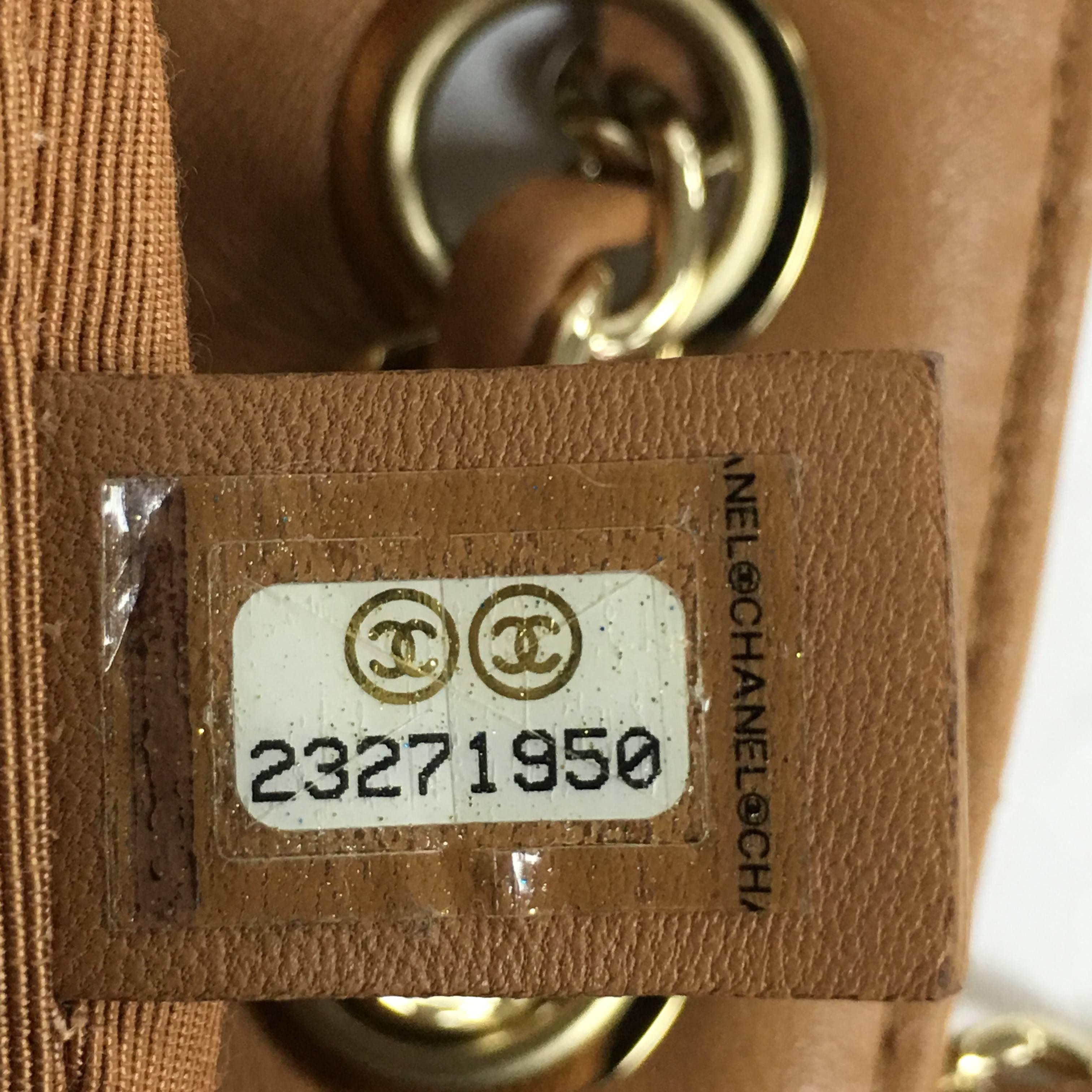Chanel Drawstring CC Lock Quilted Lambskin Small Bucket Bag  In Good Condition In NY, NY