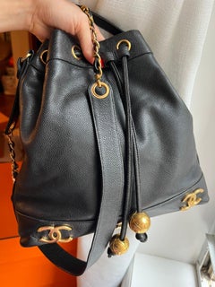 Chanel Drawstring Vintage Caviar Bag With CC Logos 24k Plated Hardware