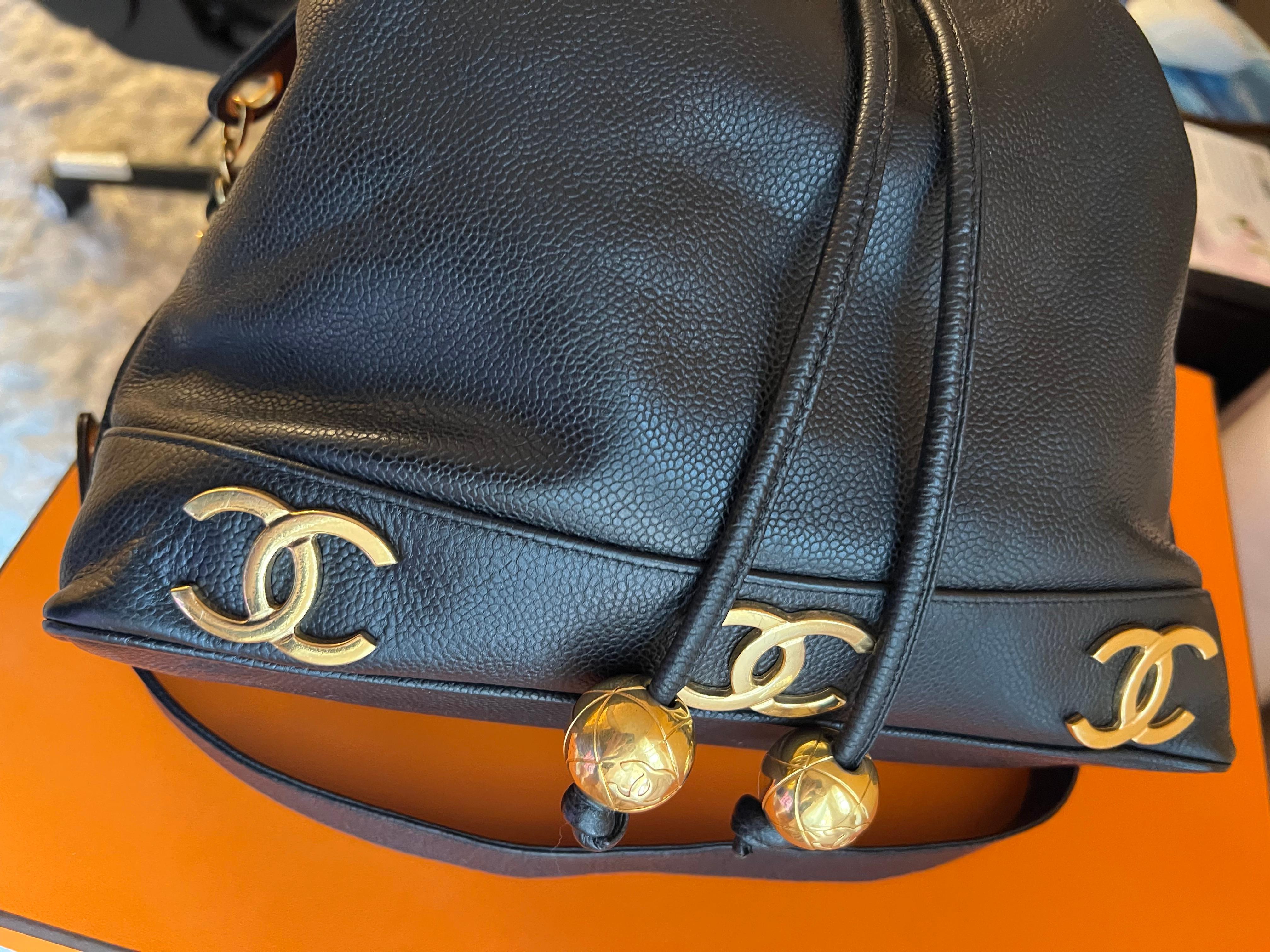 Women's or Men's Chanel Drawstring Vintage Caviar Bag With CC Logos 24k Plated Hardware For Sale