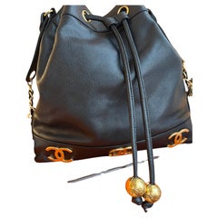 Chanel Drawstring Vintage Caviar Bag With CC Logos 24k Plated Hardware