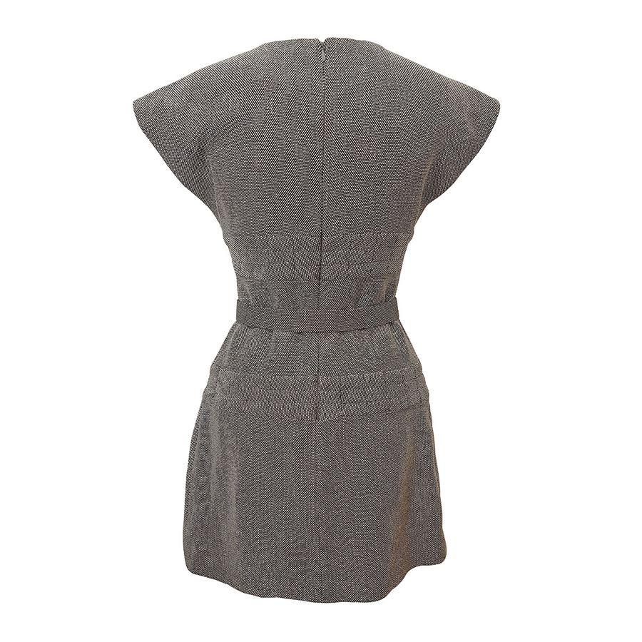Cotton (54%) Viscose (20%) Wool (20%) Nylon (6%) Grey color Round neck Sleeveless With belt Total length cm 83 (32,67 inches) French size 36, italian size 40

