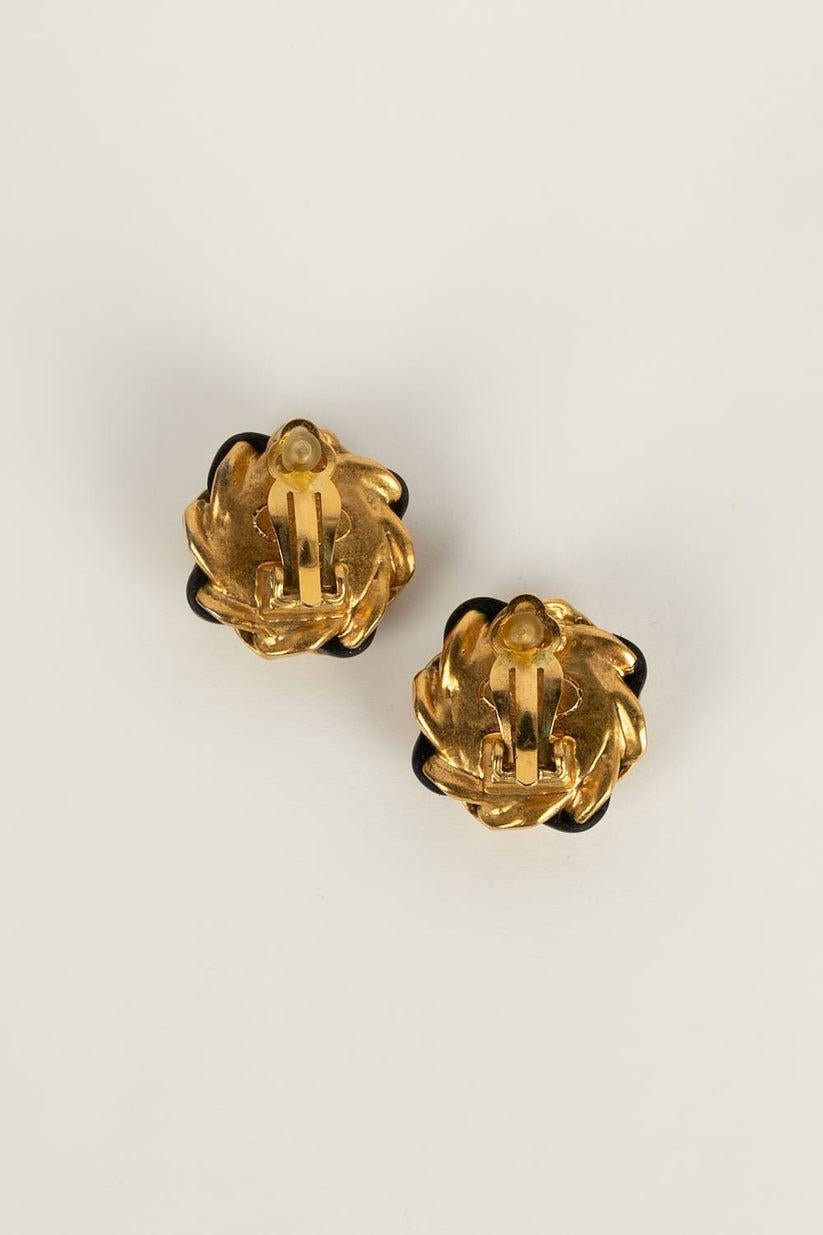 Women's Chanel Earring Clips in Gold Metal Interlaced with Leather