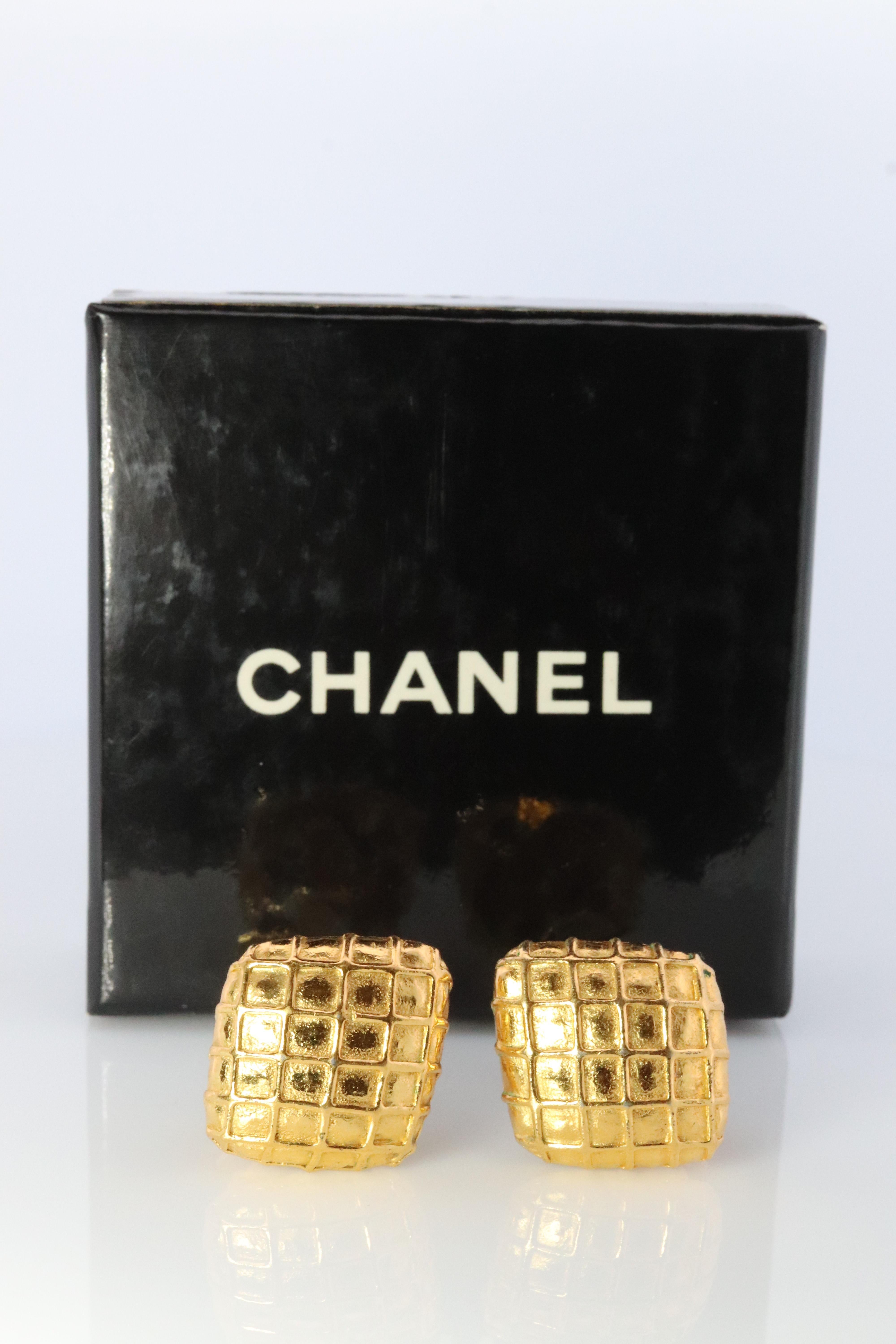 Chanel Earrings
Non-Pierced Omega Clip on Earrings.
Waffle Design
Details:

22mm by 24mm  shields

Comes with original Chanel Box

Please ask for additional pictures and questions.